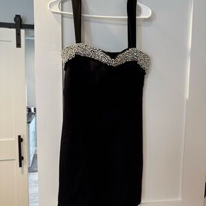 Elegant Black Dress with Embellished Neckline
